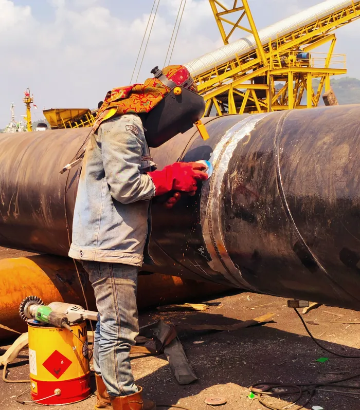 Pipeline work on a red deck