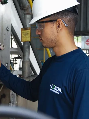 Operator at a control panel
