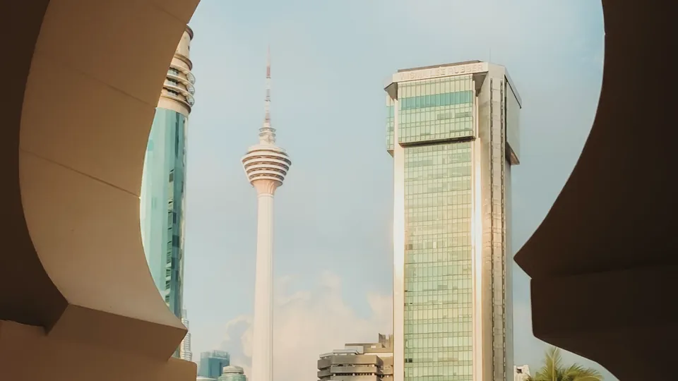 Kuala Lumpur Tower seen through an arch
